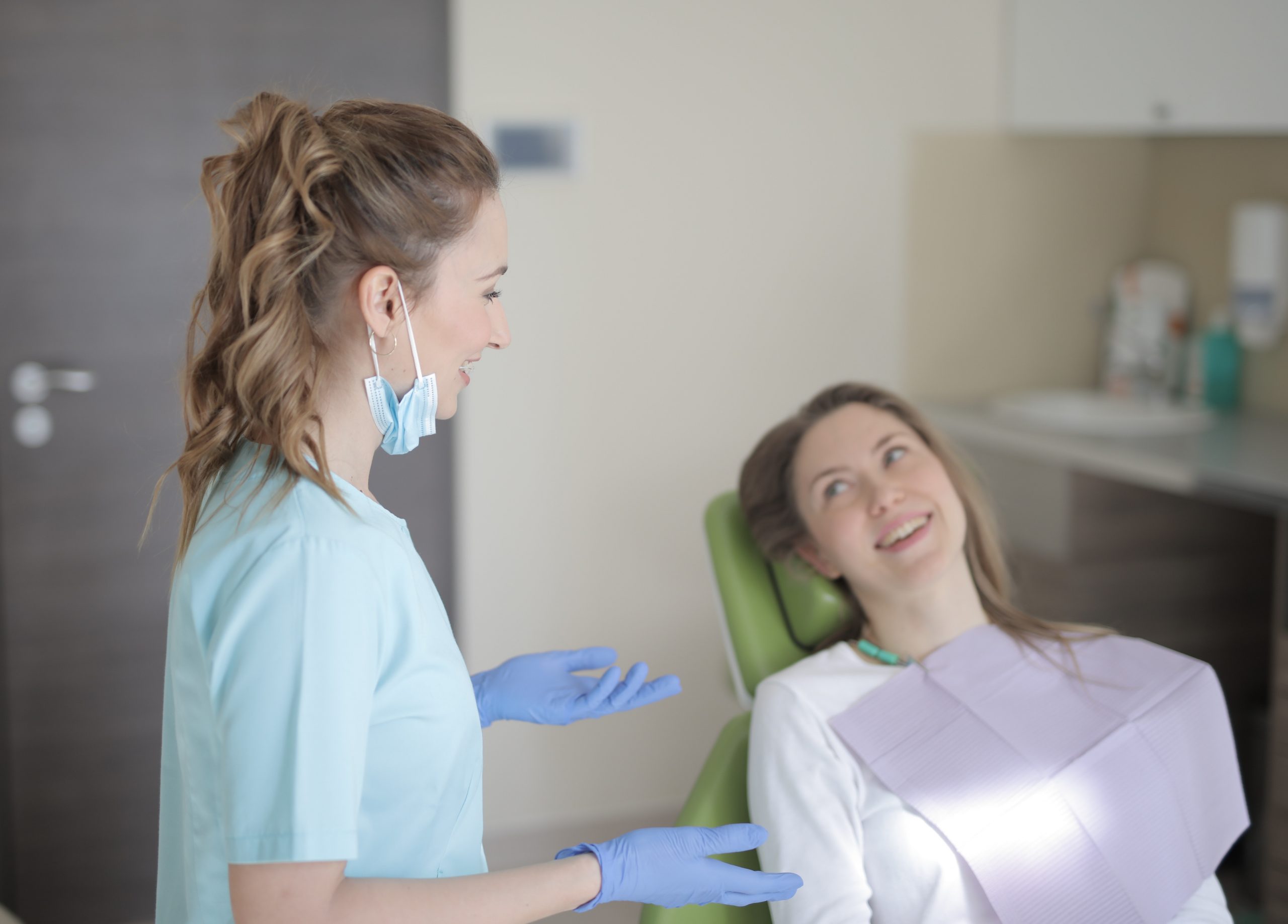 Dentist Discussing Treatment with Patient