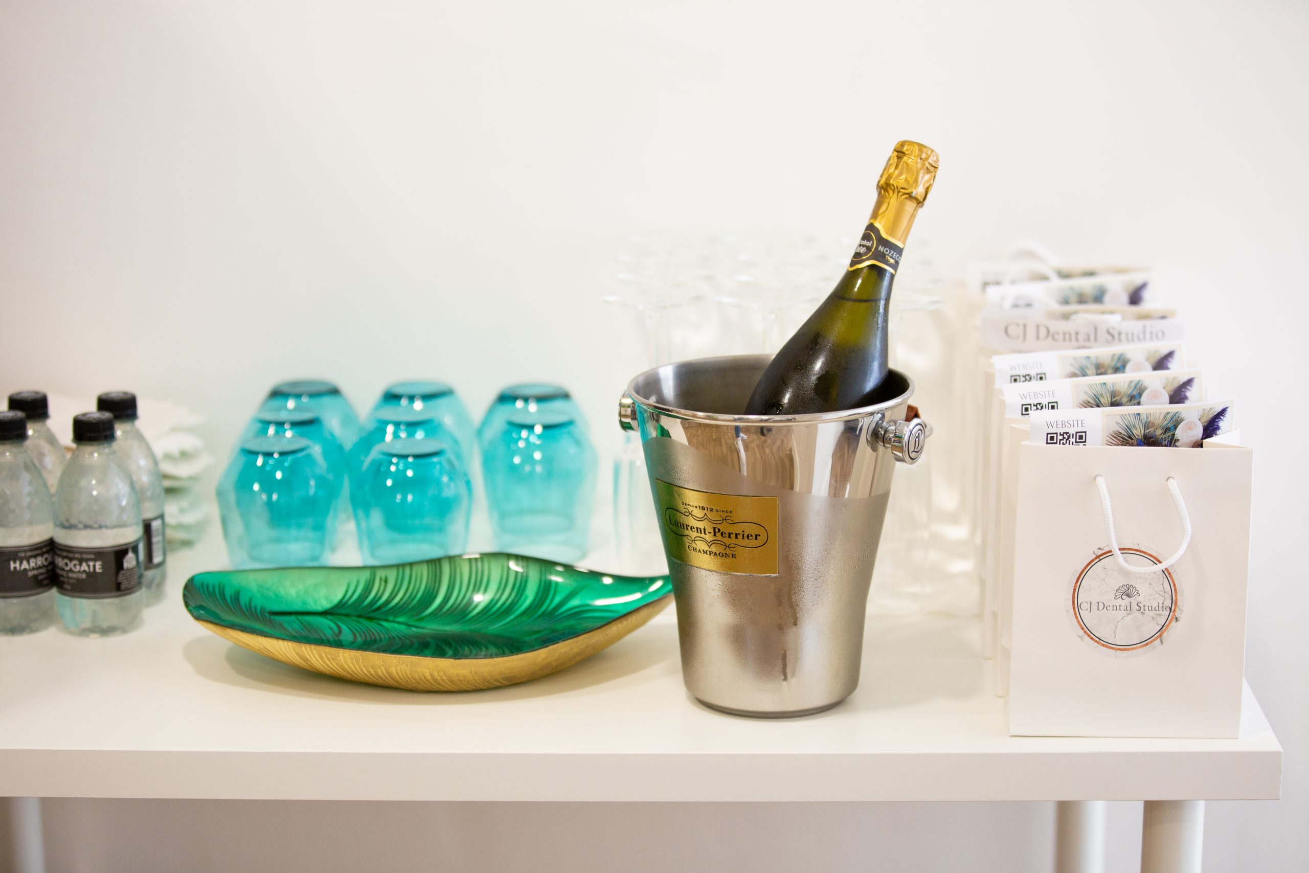 CJ Dental Studio official opening photo drinks, glasses and goodie bags.